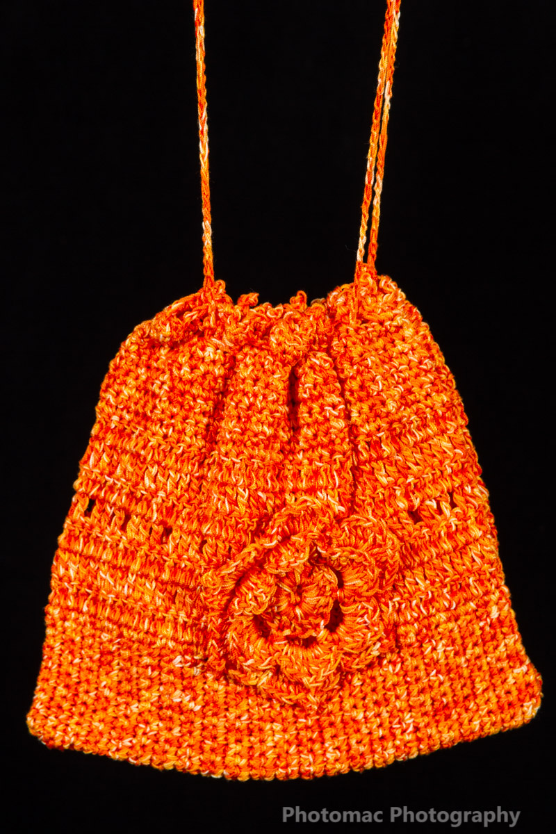 Verigated orange flower bag